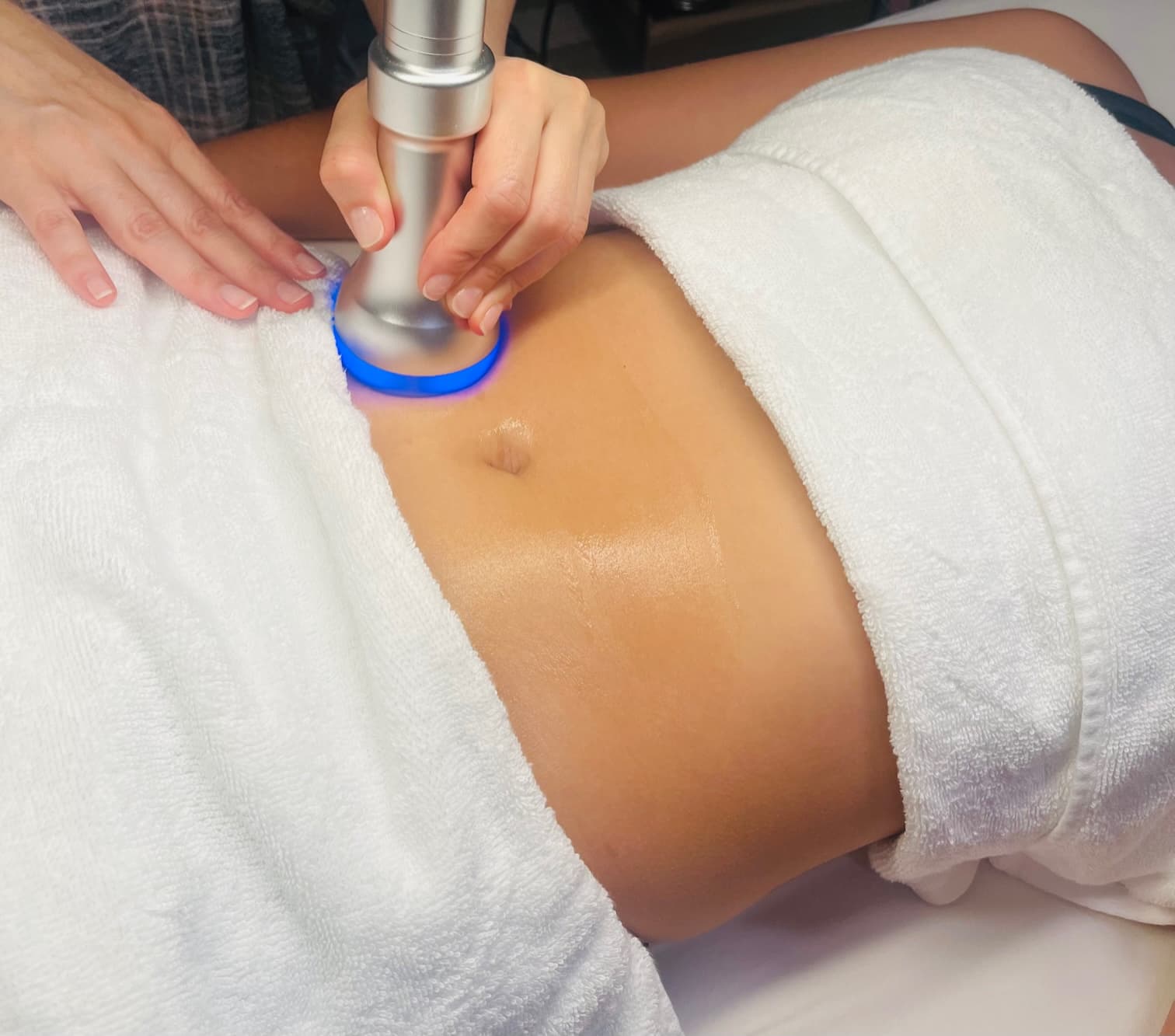 Clean, professional medical spa treatment room with neutral tones at Leveza Day Spa in White Plains